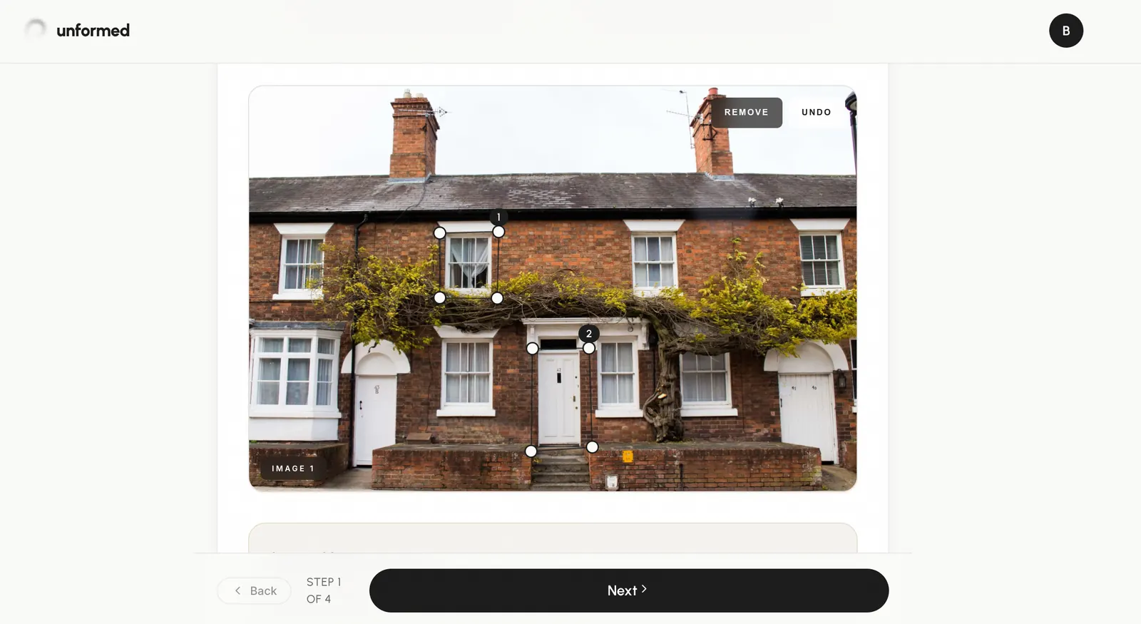 The photo with numbered pins on two windows and a door.